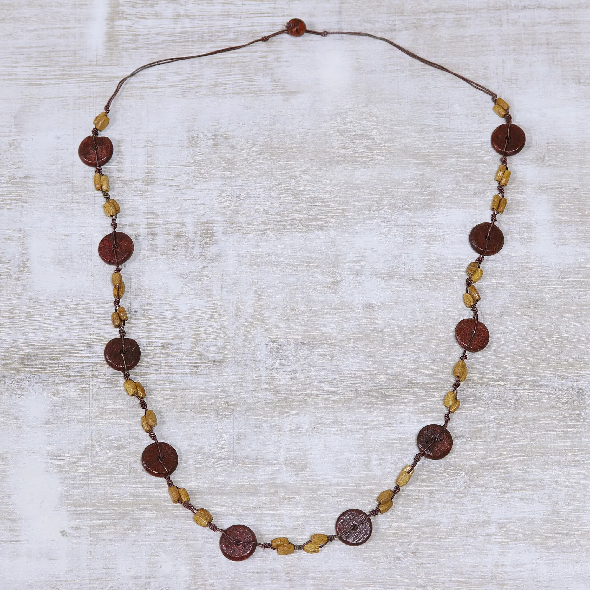 Creative Fusion in Brown Haldu Wood Beaded Long Necklace in Brown from India
