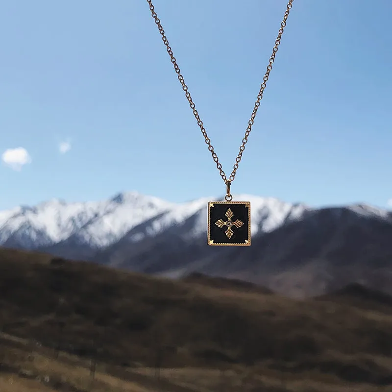 Elegant Gold-Plated Square Pendant Necklace with Embossed Snowflake Design