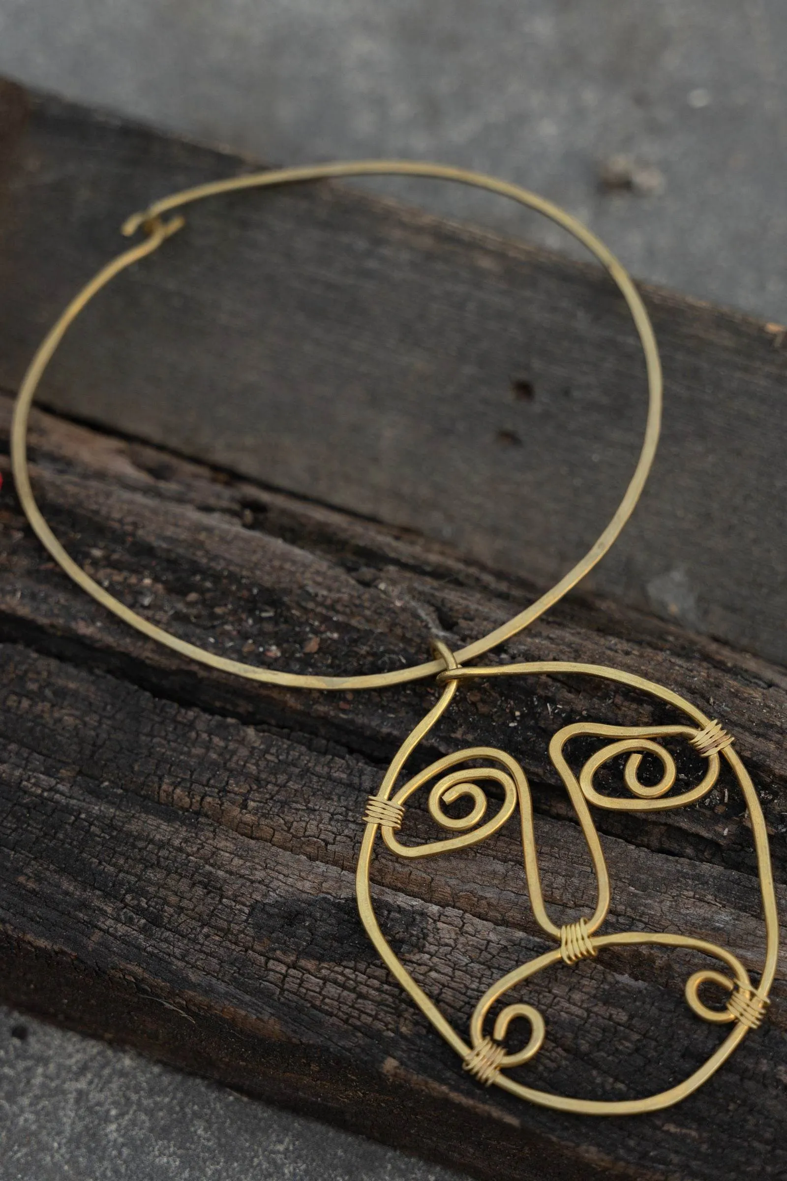 Handmade Dokra Brass Abstract Face Spiral Necklace - Unique Artistic Statement Jewelry