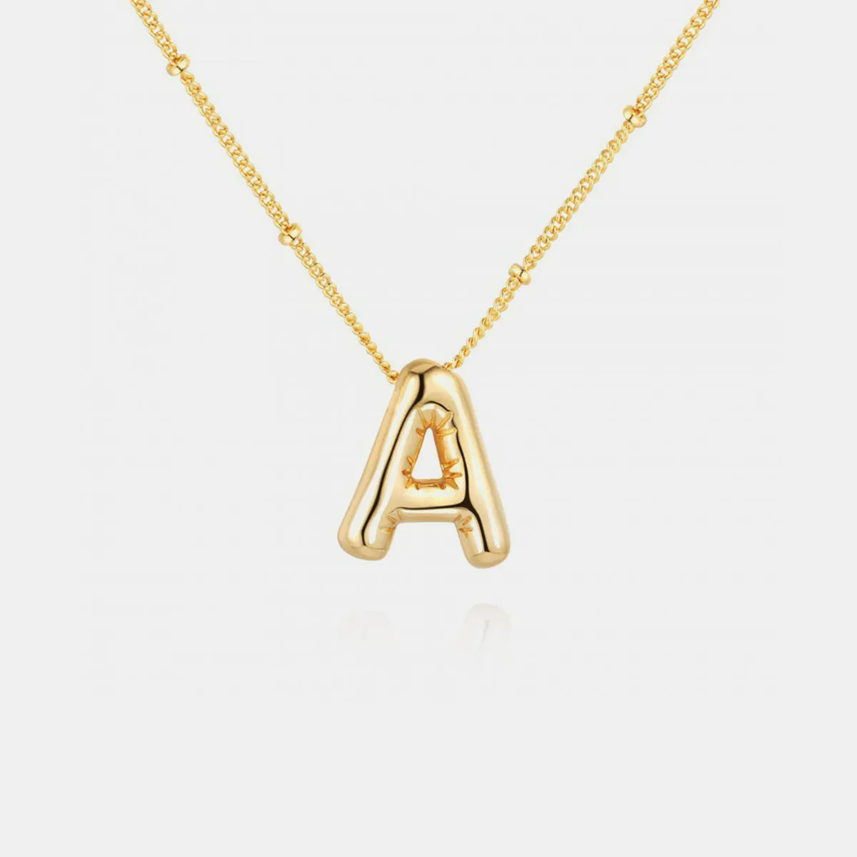 Personalized Chic: Gold Plated Bubble Initial Necklace