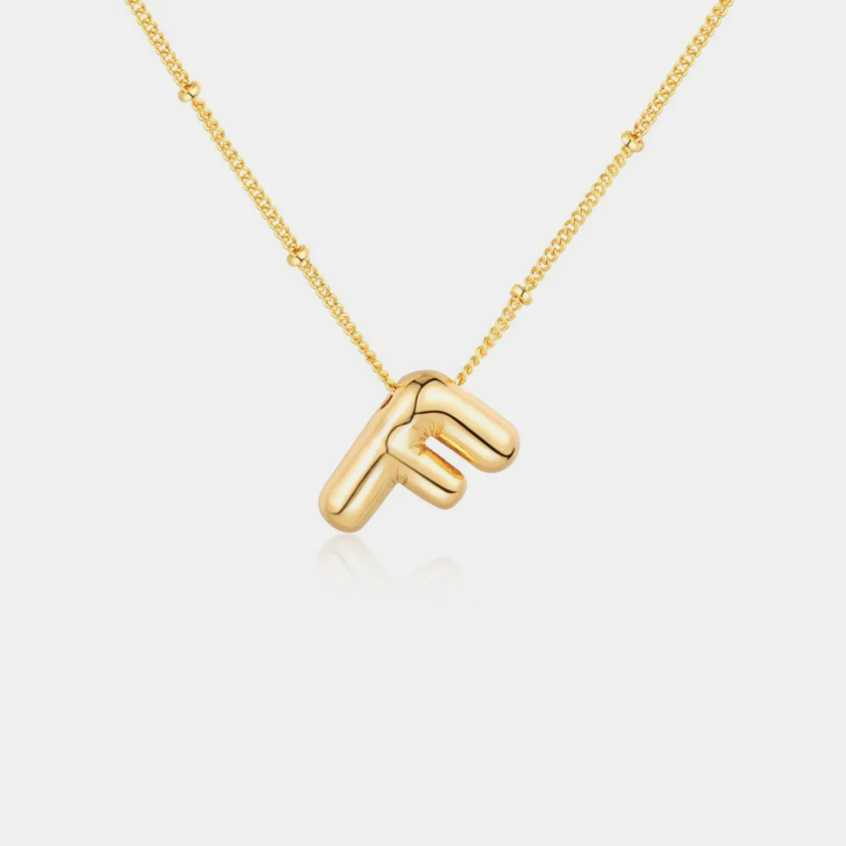 Personalized Chic: Gold Plated Bubble Initial Necklace