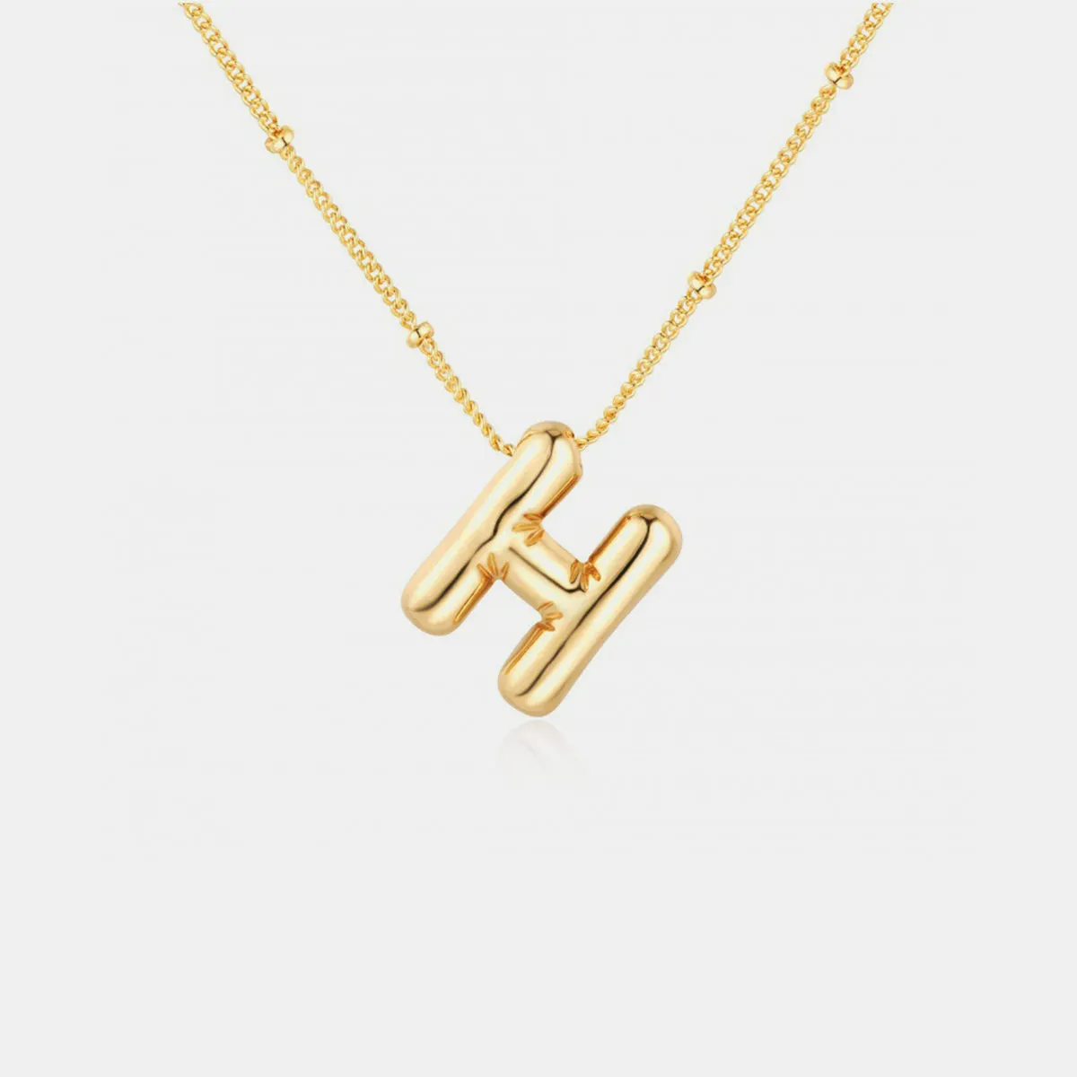 Personalized Chic: Gold Plated Bubble Initial Necklace