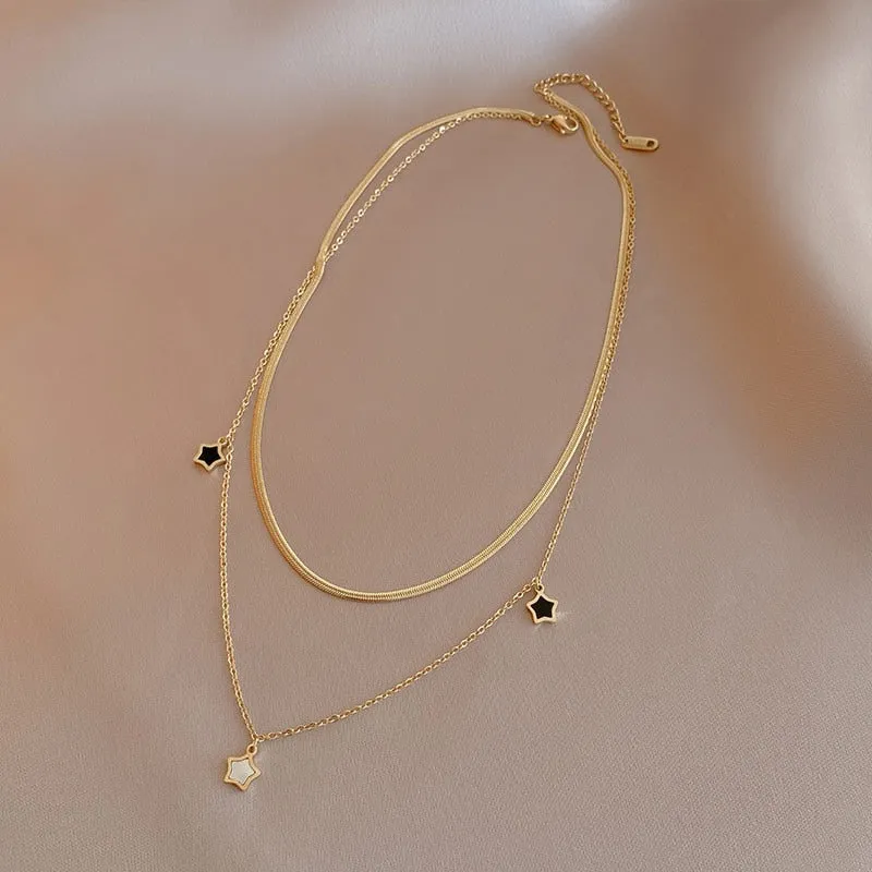 Shoot for the Stars Black and White Multilayer Necklace and Bracelet Collection