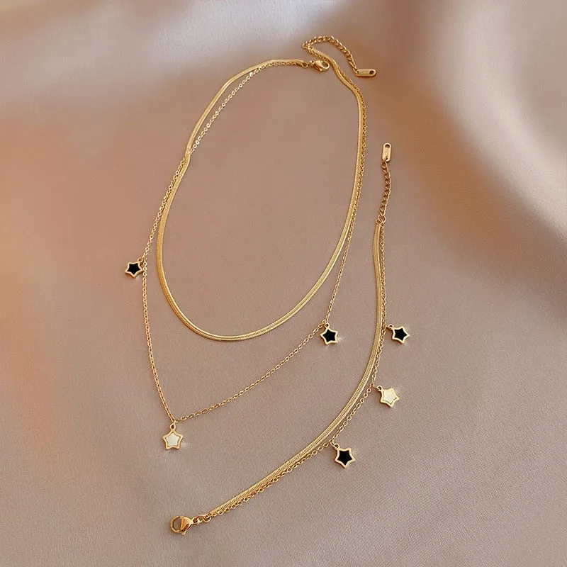 Shoot for the Stars Black and White Multilayer Necklace and Bracelet Collection