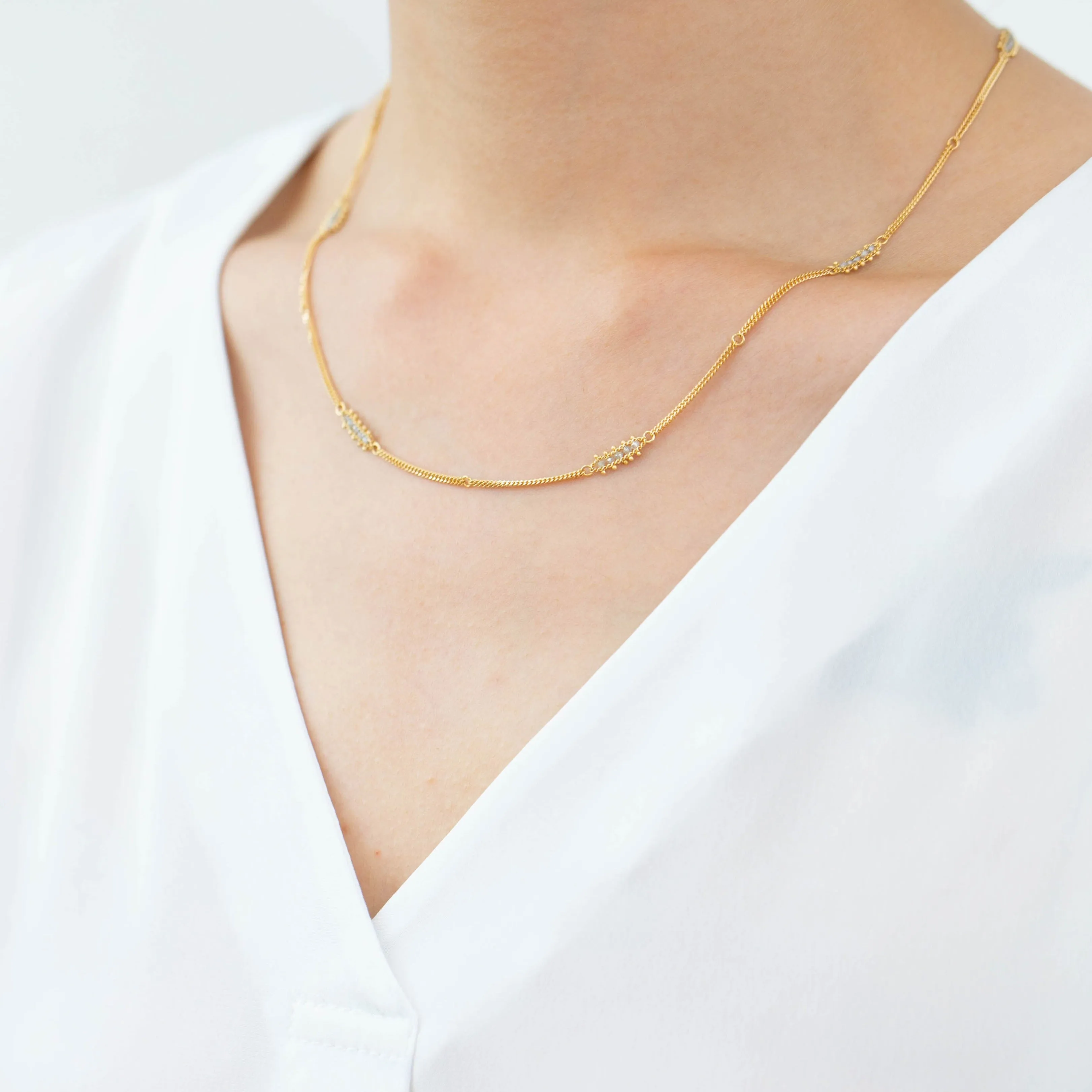 Silver diamond textile station necklace